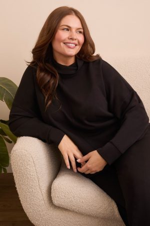 Techno Lux Drop Shoulder Funnel Neck Knit Top-Black